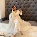 Elegant White Alia Cut Anarkali gown with luxurious fabric and full sleeves, perfect for weddings and festivals.