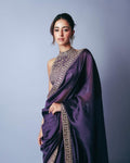 Close-up of thread and sequin work on Jimmy Chu saree fabric