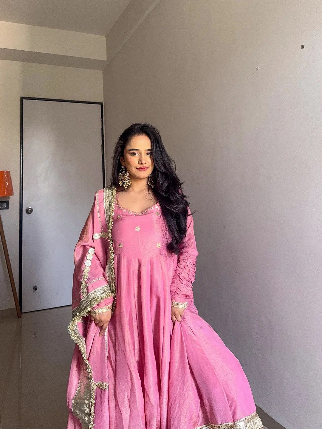 Full View of White Anarkali set with sequin embroidery, lace border, and matching dupatta