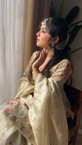Close-up of the embroidery on the ghaghra fabric, showcasing its detailed craftsmanship.