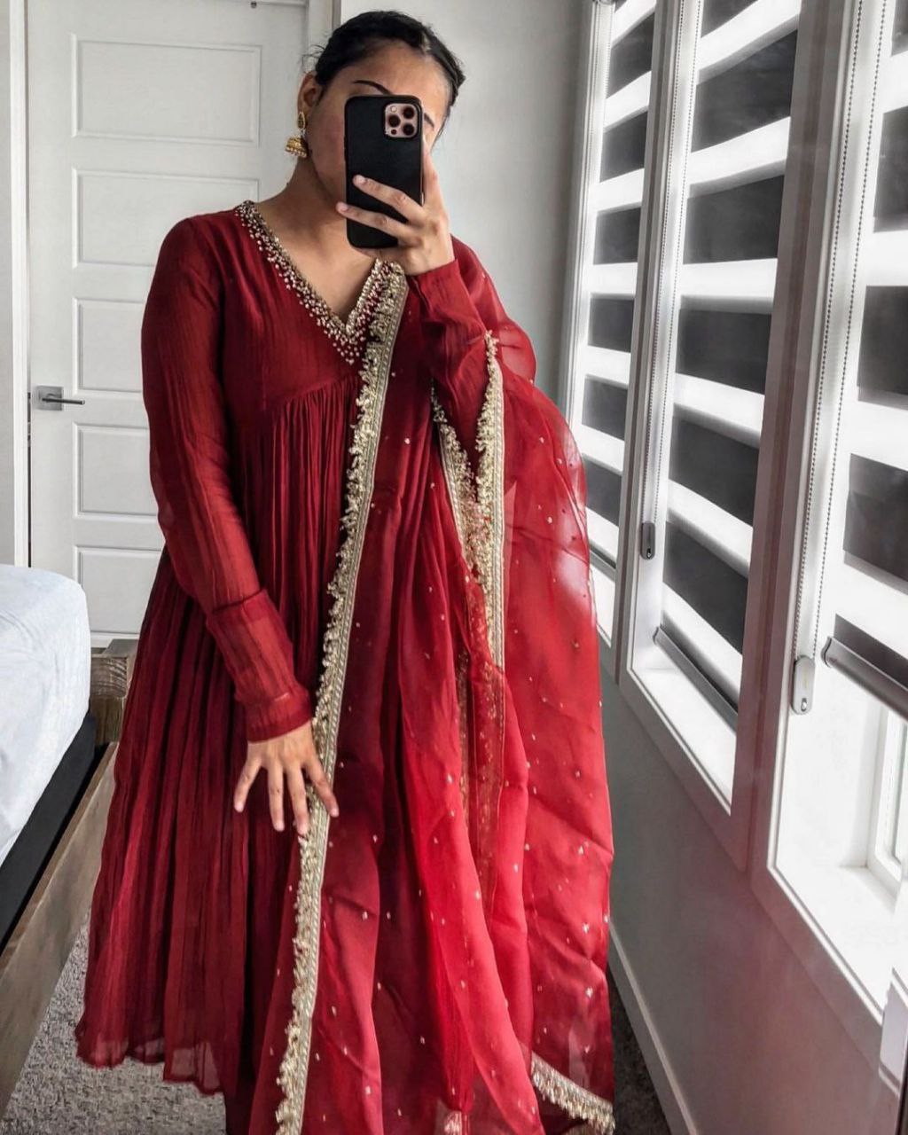 Exquisite Red Alia Cut gown with a soft Micro Cotton inner lining, paired with matching plazzo and dupatta.
